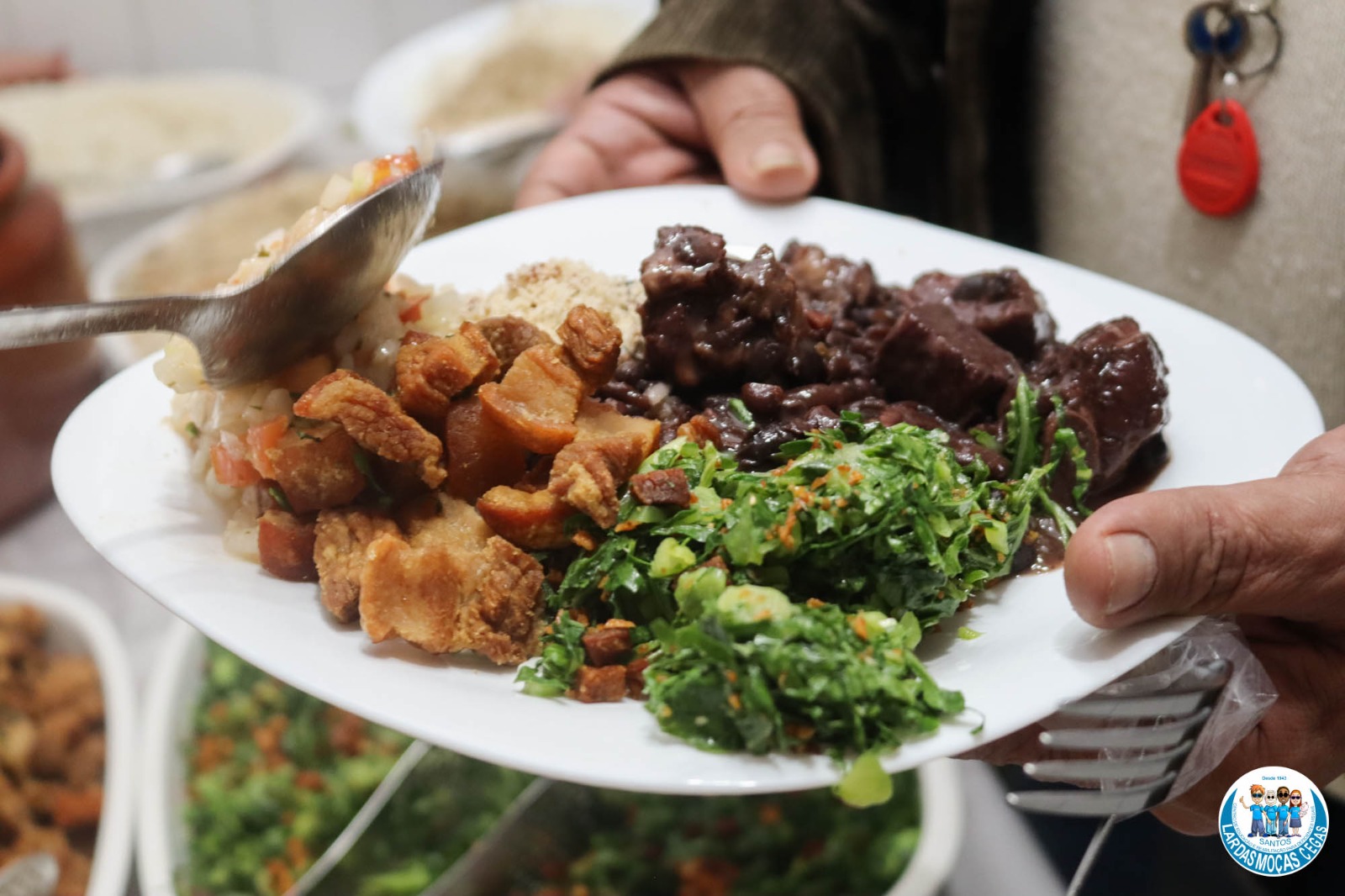 Feijuca do Lar: pagode, feijoada e solidariedade